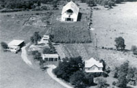 aerial photo of river view farm